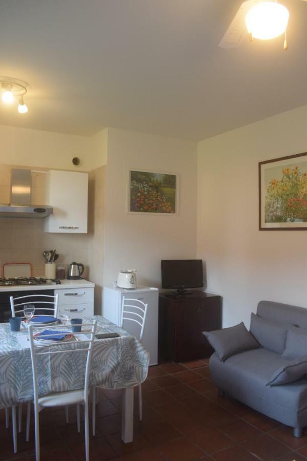 Landscapesilvia Pt Terra Apartment Menaggio Bagian luar foto