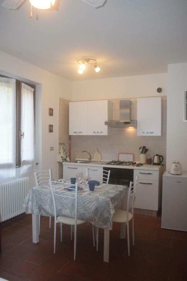 Landscapesilvia Pt Terra Apartment Menaggio Bagian luar foto