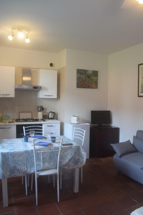 Landscapesilvia Pt Terra Apartment Menaggio Bagian luar foto